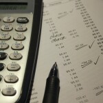 calculator, pen, bill