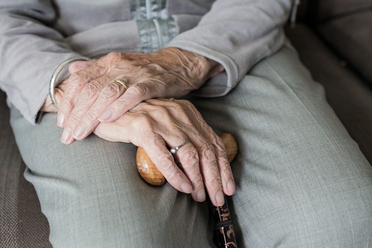 Old persons hands -relates to Retirement Age Dilemma: Should We Work Longer? the Pros and Cons of Raising Retirement Age