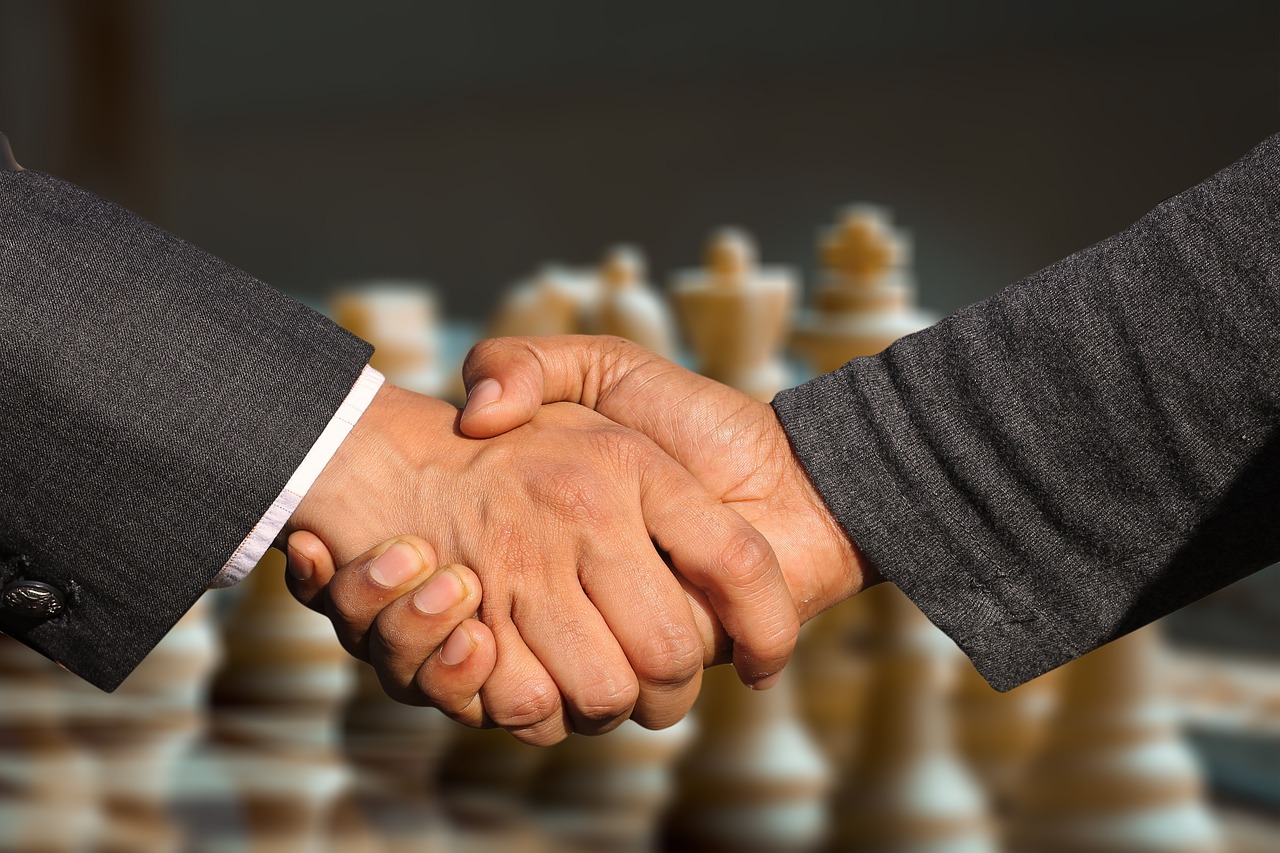 handshake, chess board