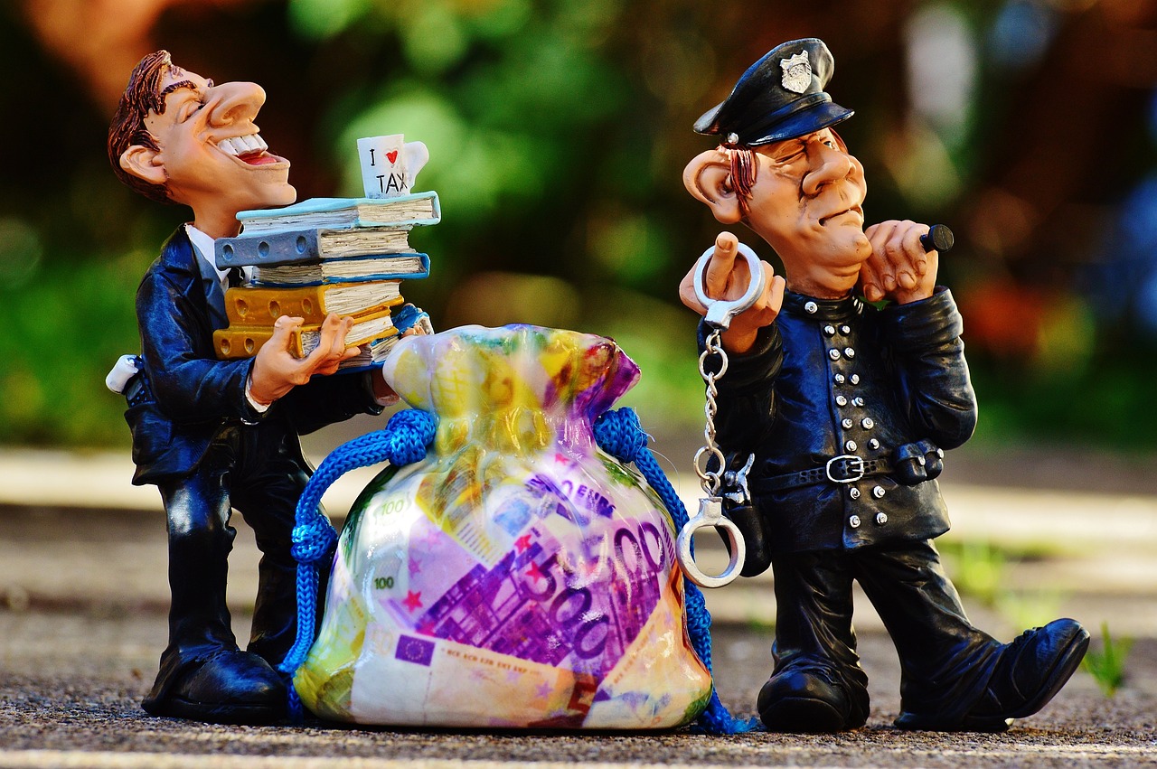 Animated image of a man with files and money bag, and a police with handcuffs