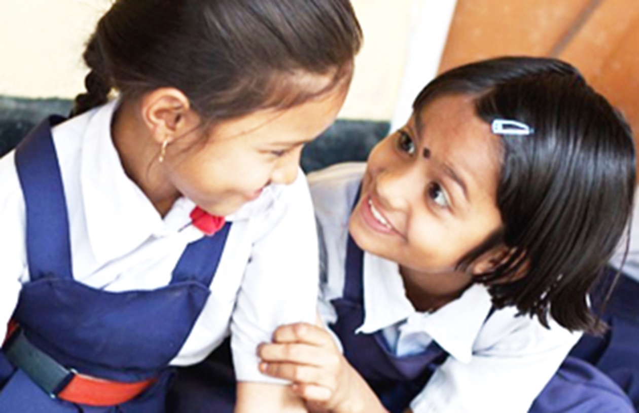 School girls chatting in the classroom -related to NEP: A Blueprint for India's Economic Future, Transforming Education