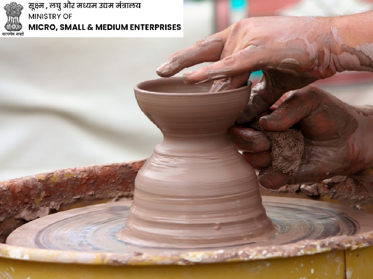 potter making pots on spinning wheel under the Vishwakarma Loan Scheme