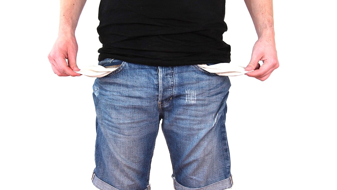 A person showing empty pockets -image tries to explain Why Millions of Indian Men are unemployed & How to Fix this issue