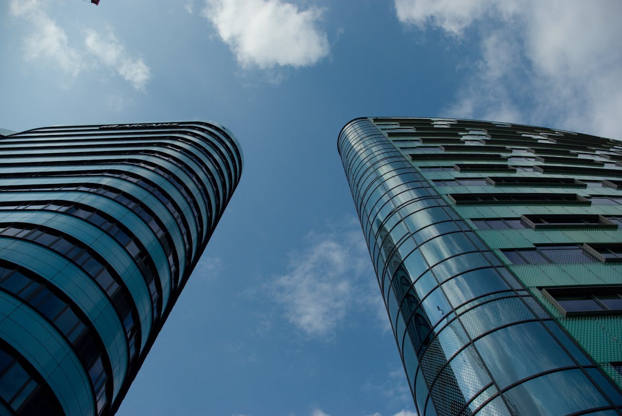 Image of two high rise buildings - image relates to FDI in India: Boom or Bust? Why Foreign Investment on Rollercoaster