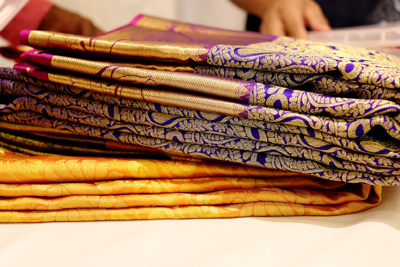 Closeup of Silk Saree - image tries to explain The Life and Earnings of Kancheepuram Saree Weavers