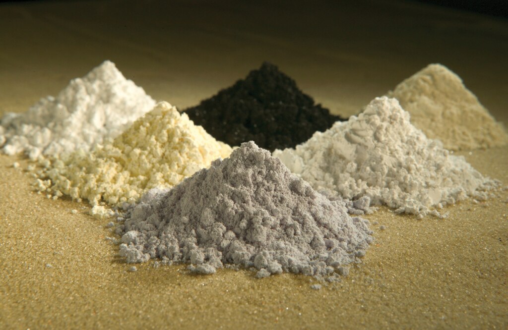 praseodymium, cerium, lanthanum, neodymium, samarium, and gadolinium oxides