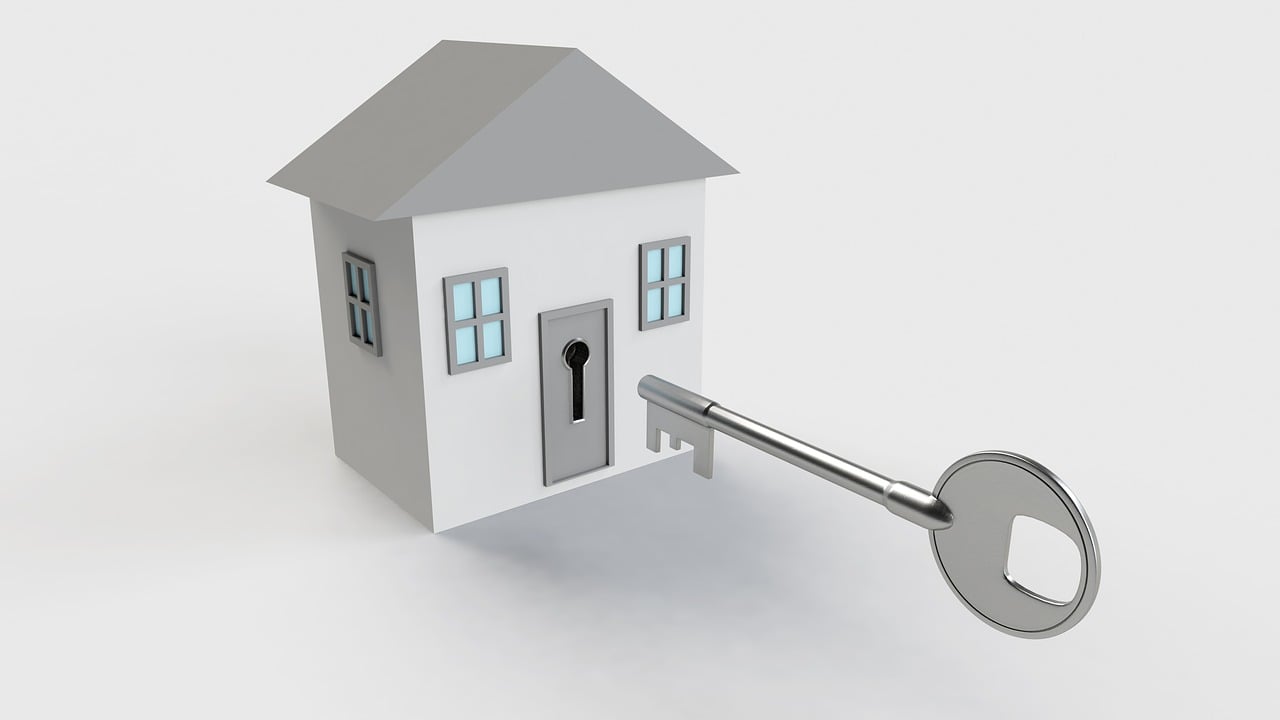model of a house with a key