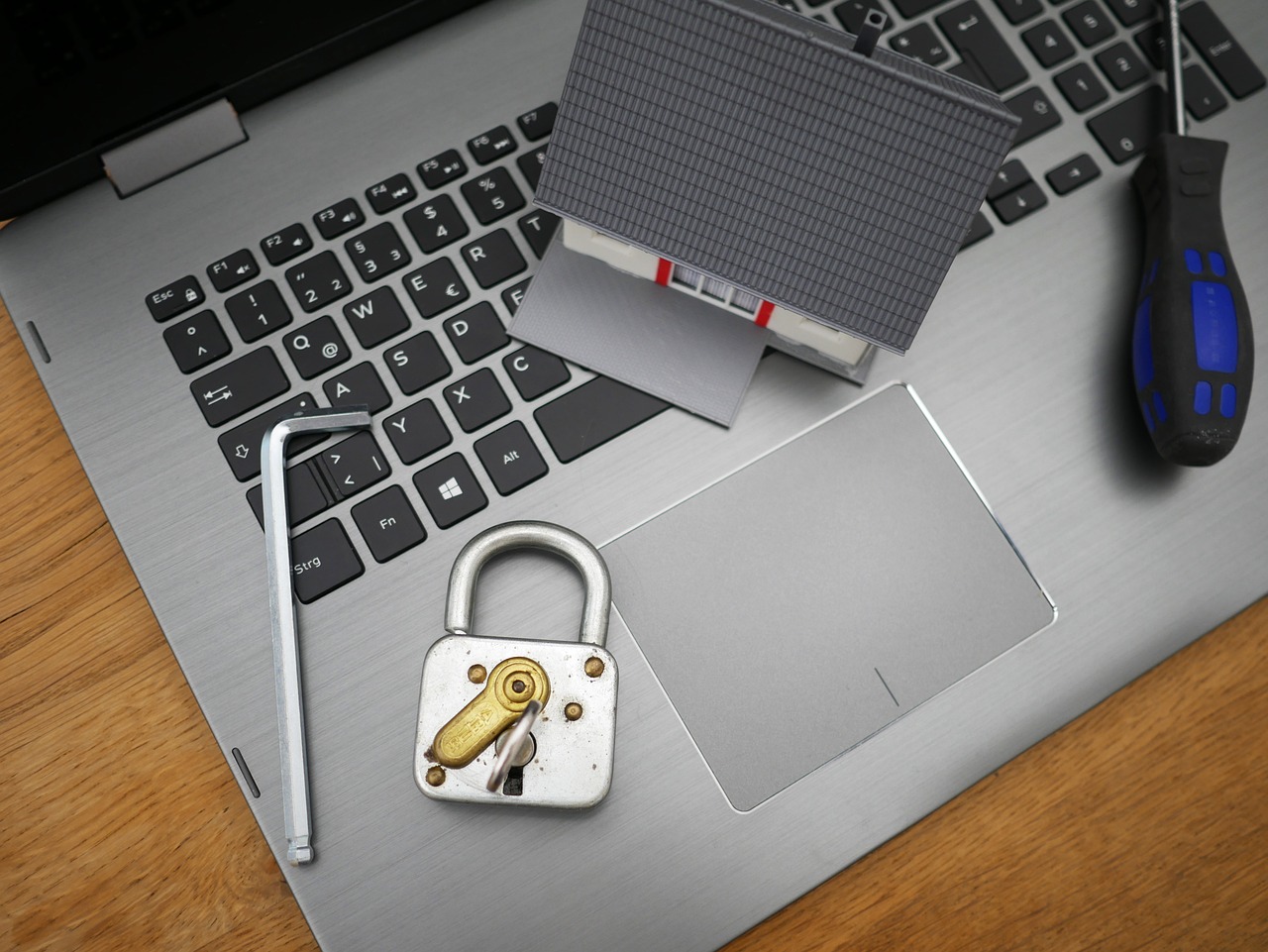 laptop, lock and key and utility tools