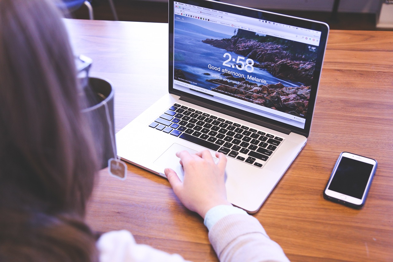 women working on laptop