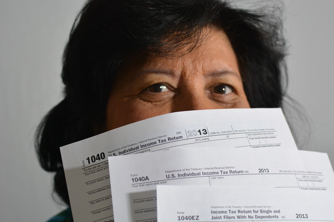 Tax filing, woman with tax forms