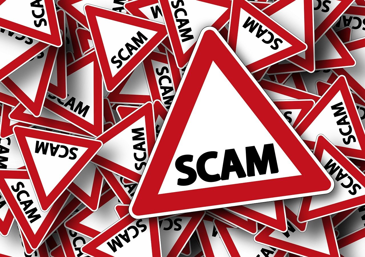 placard signs of scam